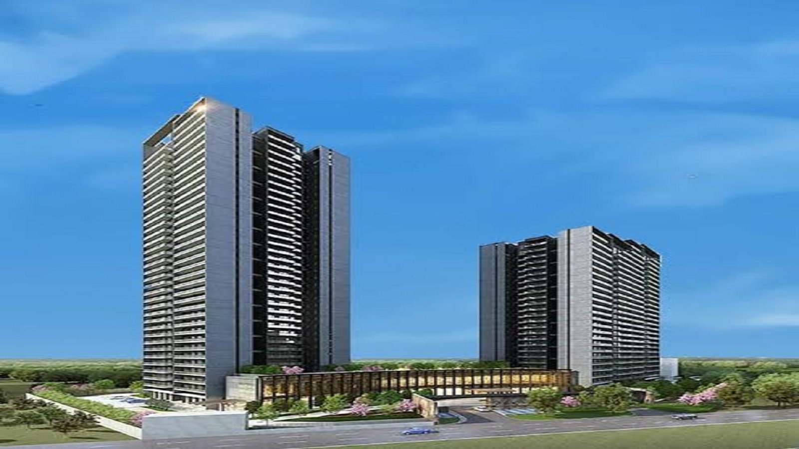 Modern high-rise residential apartment towers with contemporary architecture and landscaped surroundings in Gurgaon.